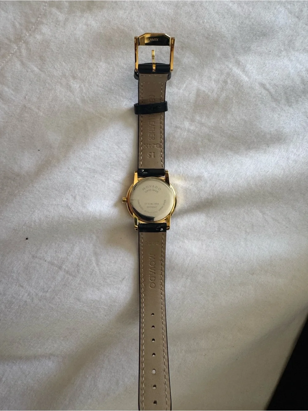 Movado Women’s Black Dial Leather Watch with Gold-Tone Case